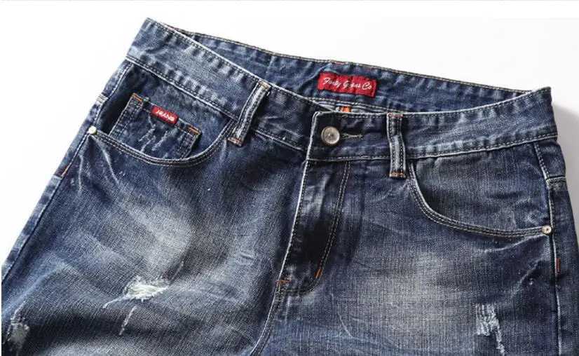 Mens blue stretch denim shorts paired with high-quality stretch casual denim jeans new summer shorts size 42 W250319