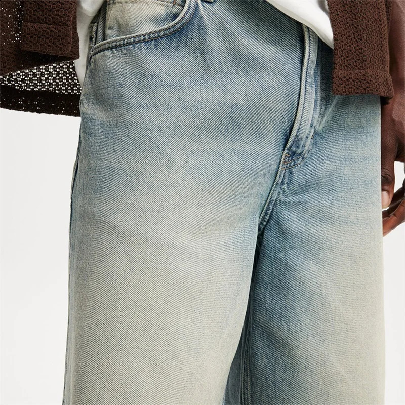 Mens retro washed denim shorts loose fit high waist creating a fashionable summer look 250319
