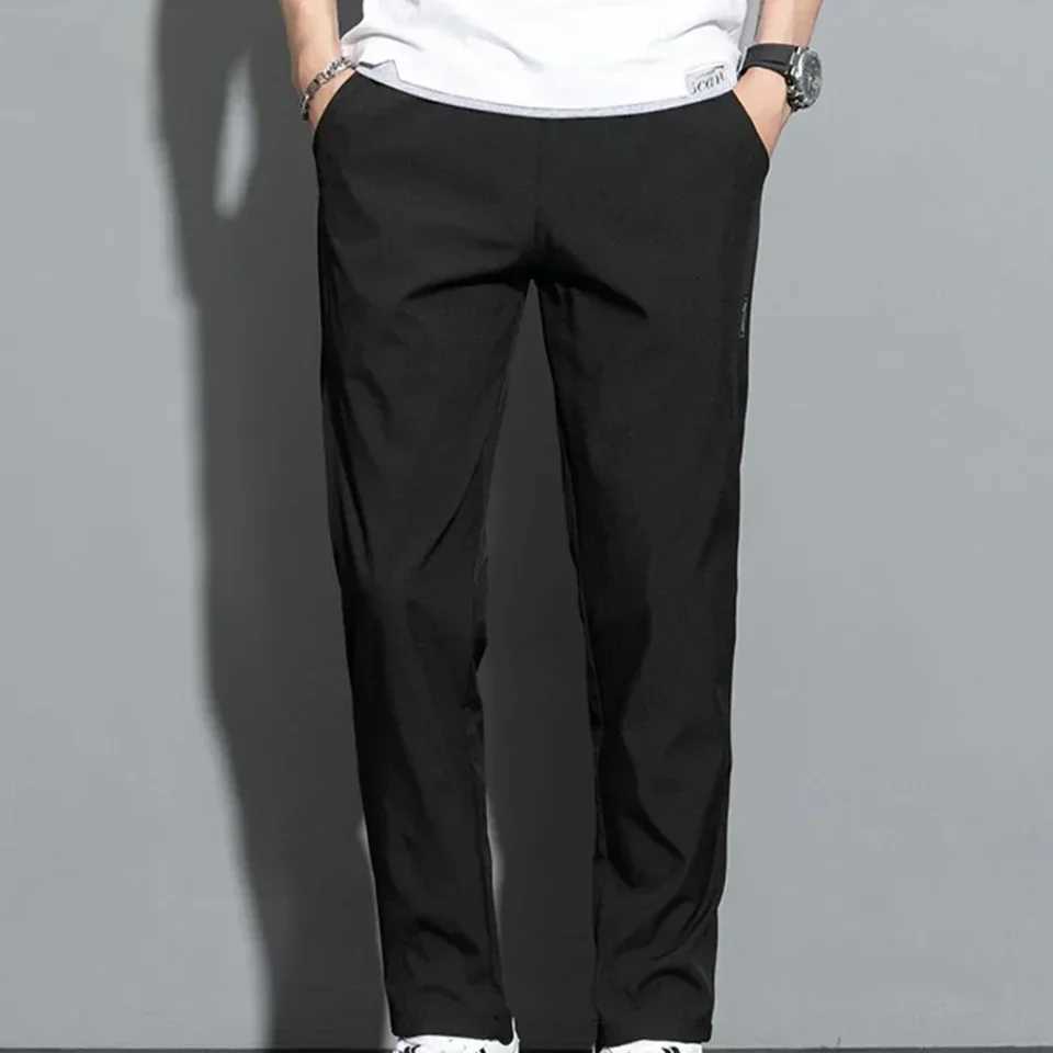 Autumn Pants Men Fitness Sportswear Tracksuit Elastic Waist Sweatpants Cotton Trousers Loose Gyms Jogger Track Pants Mens M- 5XL X250319