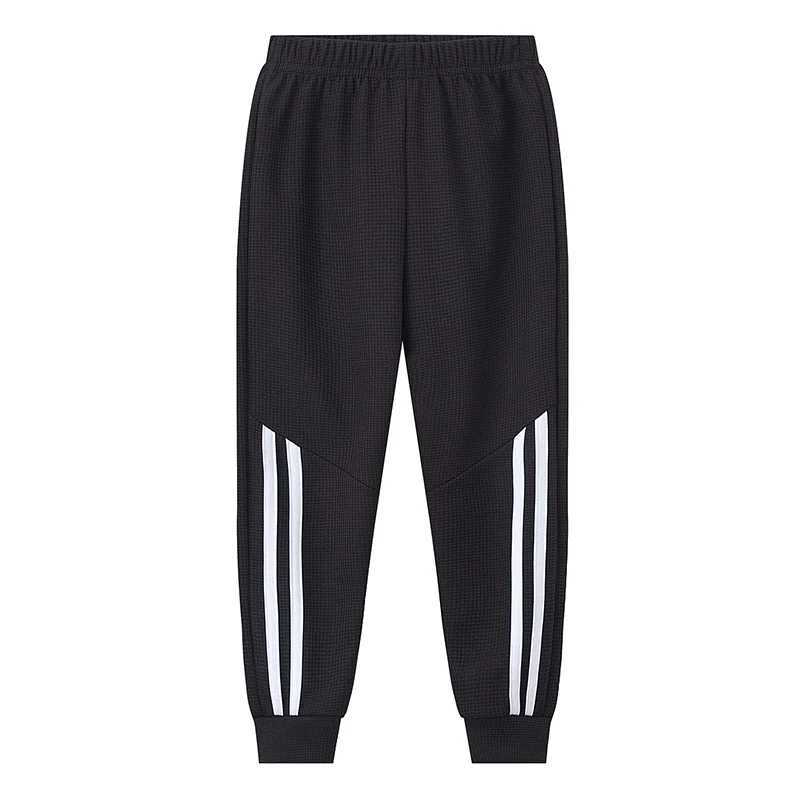 1/3 childrens waffles solid color sports pants boys casual clown harem pants elastic waist running pants girls fashionable pantsT250318