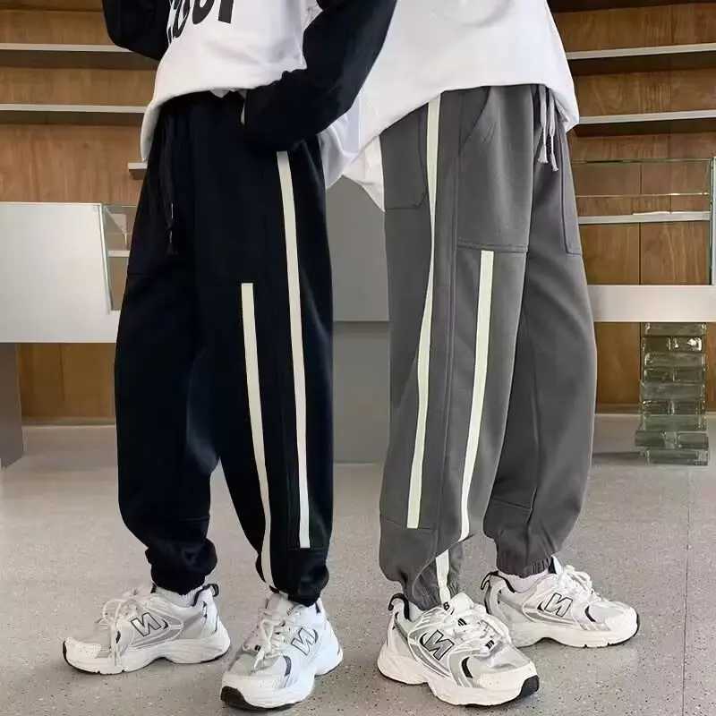 Spring and autumn childrens leisure school sports pants Trouser jogging pants Childrens loose sports pants Childrens sports pantsT250318