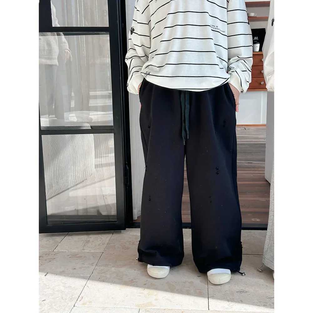 Spring 2025 Korean version of perforated knitted sanitary pants for boys and girls straight solid color casual trend styleT250318
