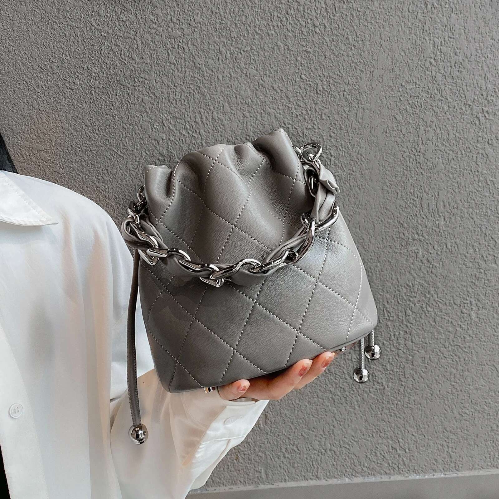 Genuine Leather Quilted Drawstring Bucket Bag Women With Chain Strap Crossbody Handbag For Daily Use And Commuting