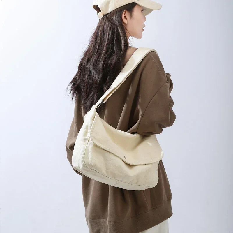 Solid canvas large capacity youth shoulder bag casual messenger womens cross body bag selling retro youth handbag 250318