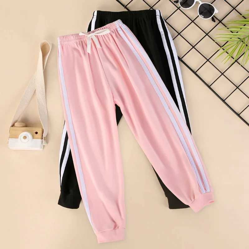 Childrens solid color sports pants for boys and girls spring and autumn casual sports clown pants elastic waist pantsT250318