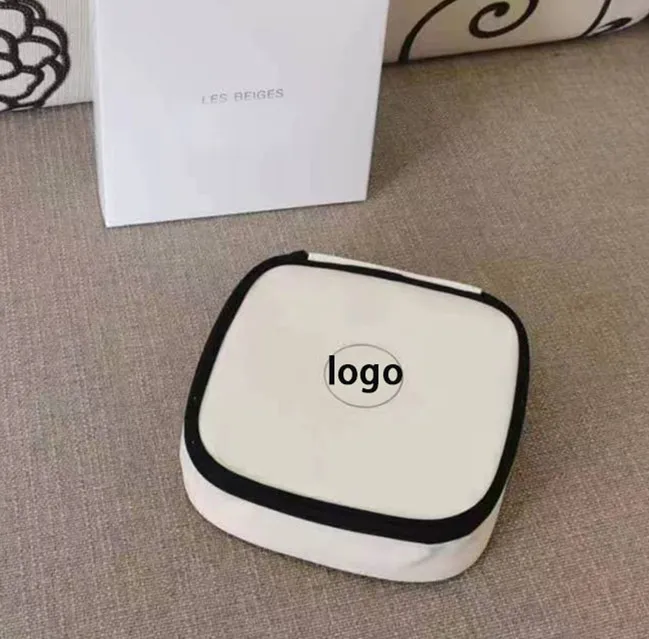 White Designer Storage Bag Women Square Shape with Classic Logo for Travel Desktop Use