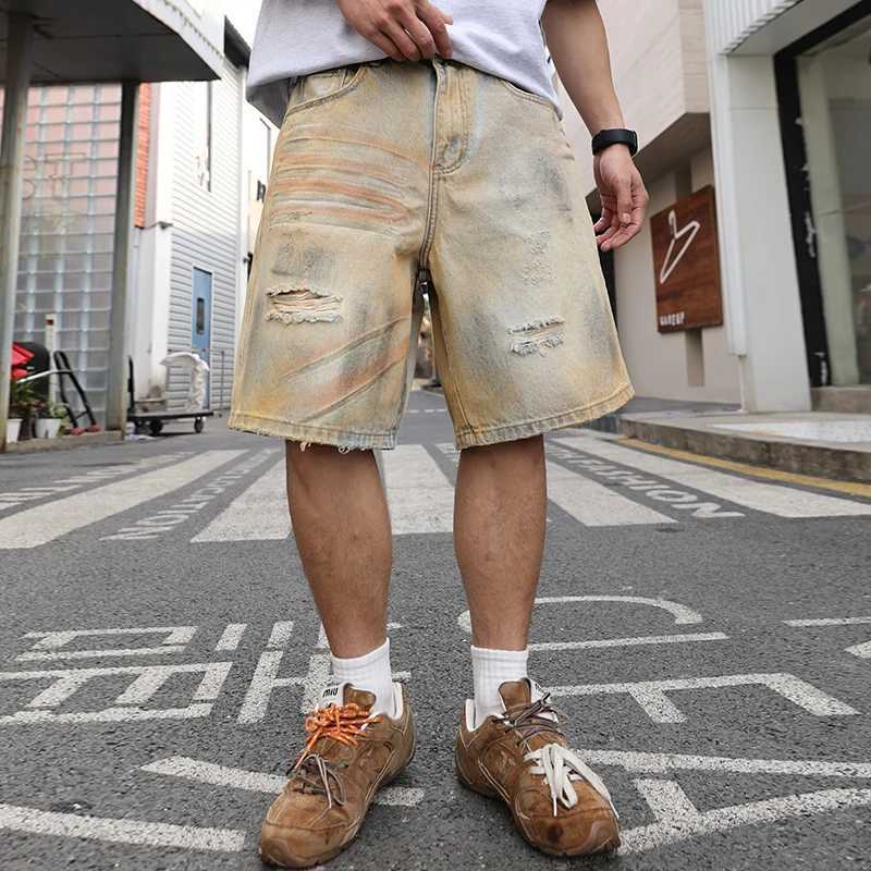 Yellow mud-dyed washed and worn-out holes straight denim cropped pants. Retro mens summer straight thin shorts are fashionable W250319