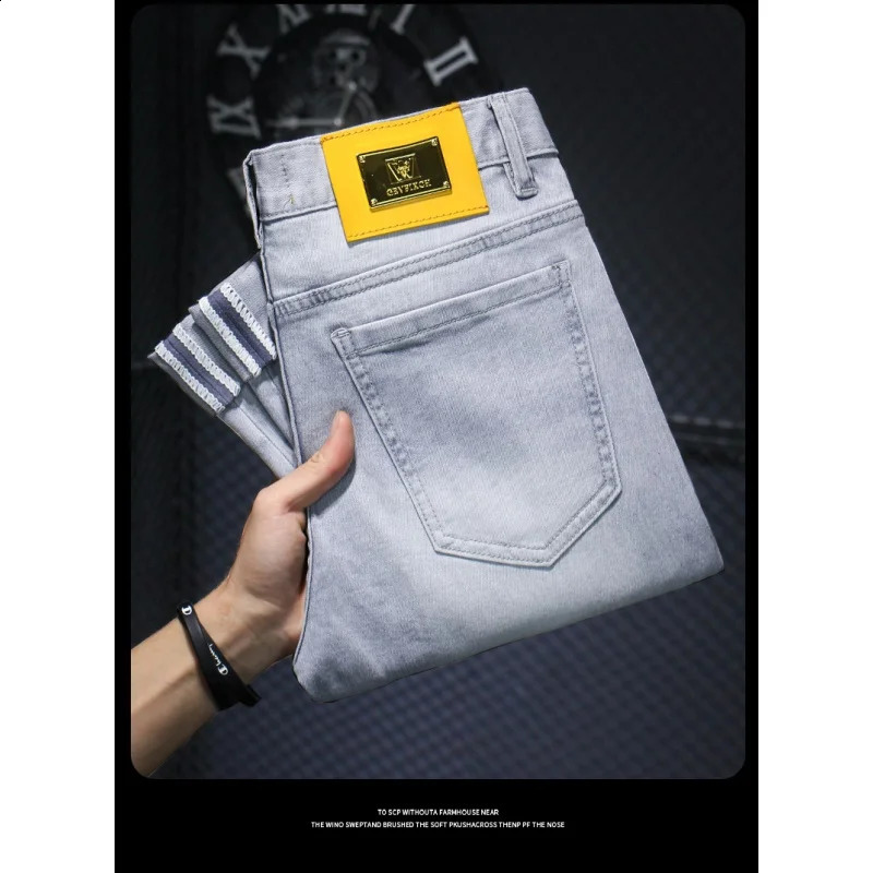Summer thin jeans MENS light luxury quality highend and fashionable simple stretch small leather tag slim fit tapered pants 250312
