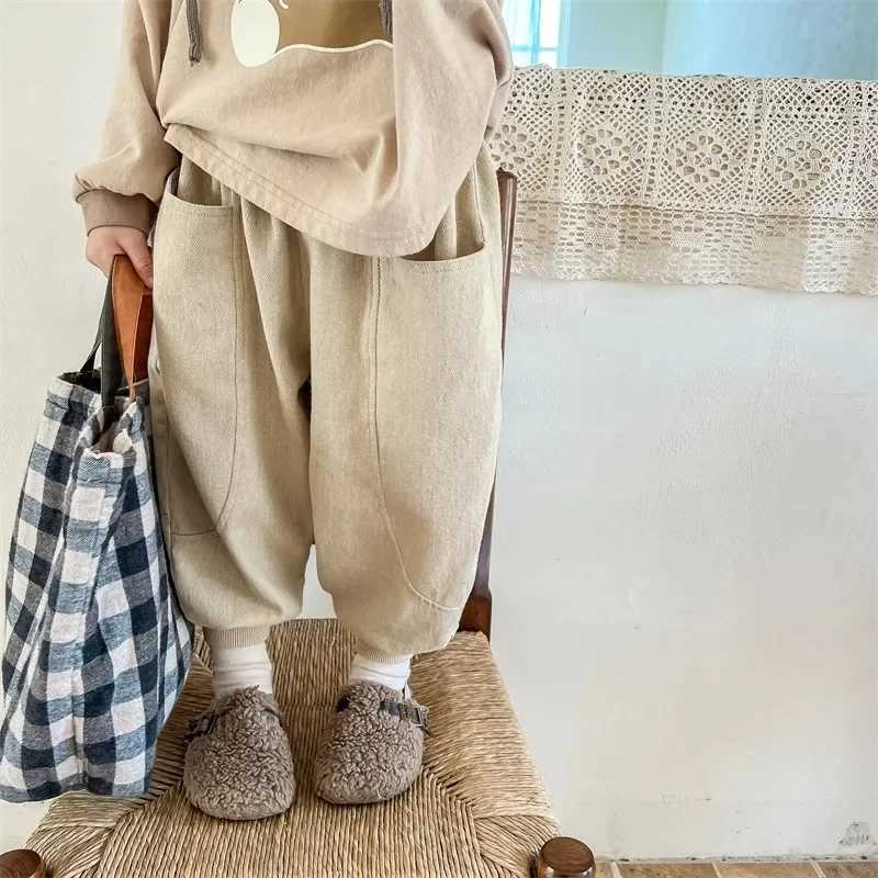 Baby retro pocket harem pants loose girls casual pants solid color boys childrens fashion pants childrens apronT250318
