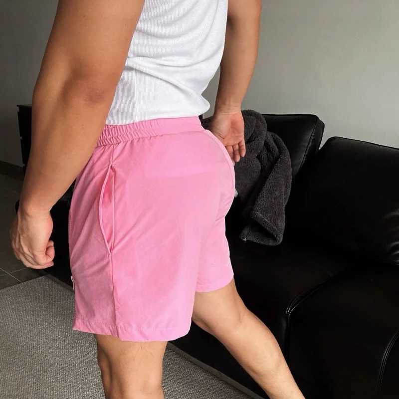 Summer sports and fitness mens shorts elastic waist double zipper thick muscle display shorts beach casual quarter pants W250319