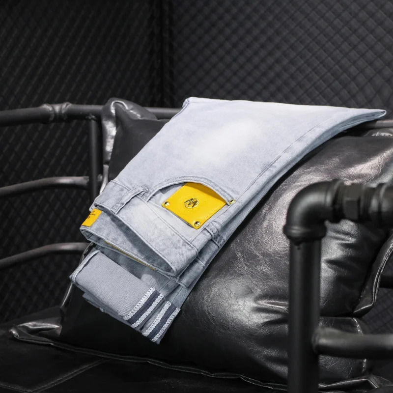 Summer thin jeans MENS light luxury quality highend and fashionable simple stretch small leather tag slim fit tapered pants 250312