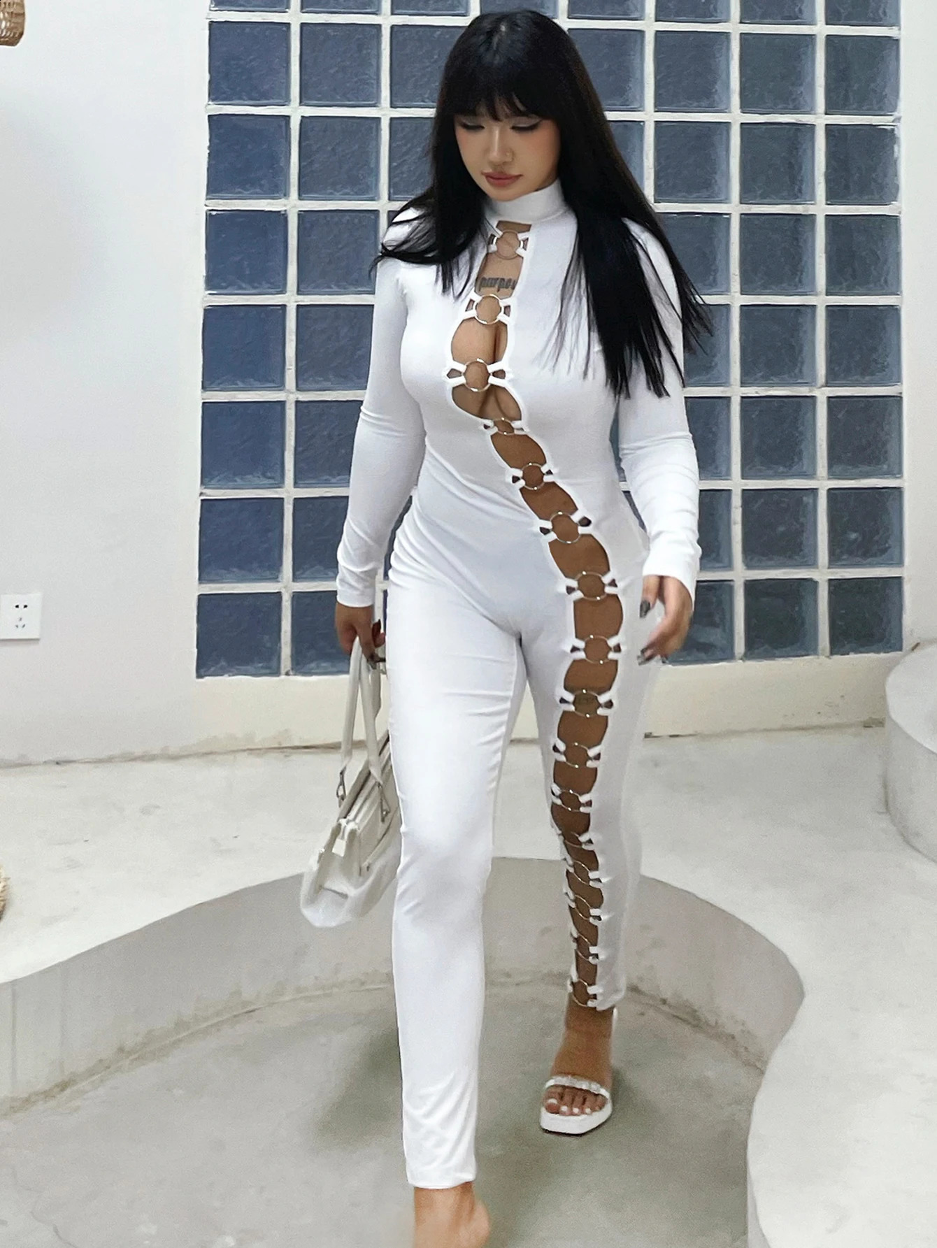 Womens stand up collar tight solid color jumpsuit with metal circle decoration long sleeved all-in-one pants fitness leggings 250318