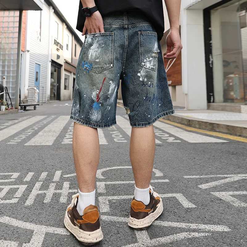 Summer US high-end trend graffiti printed hole jeans loose and fully matched mens pants W250319