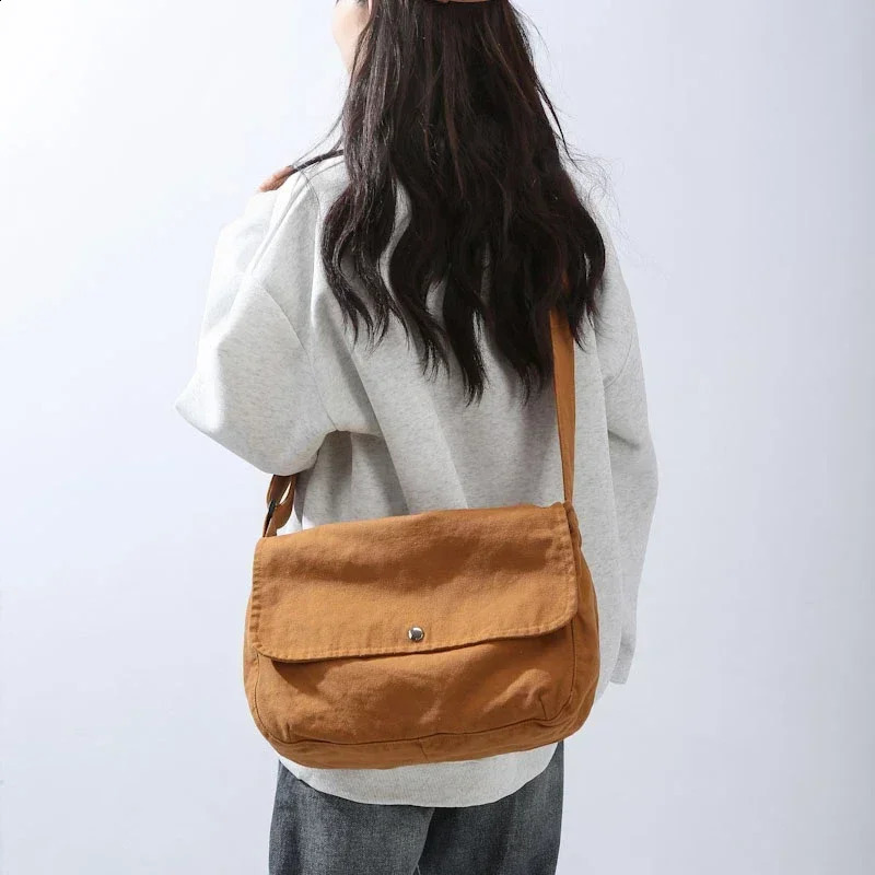 Solid canvas large capacity youth shoulder bag casual messenger womens cross body bag selling retro youth handbag 250318