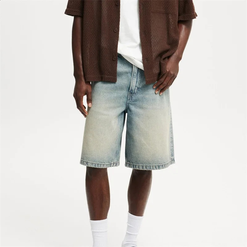 Mens retro washed denim shorts loose fit high waist creating a fashionable summer look 250319