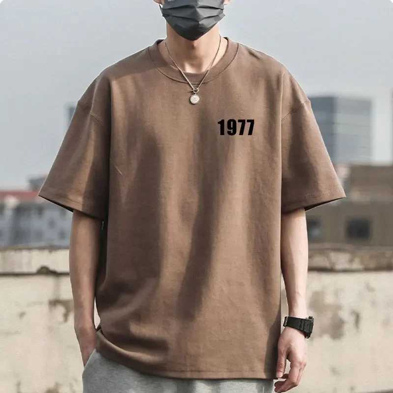 1977 Childrens Fashion Designer Mens T-shirt Cotton Couple Top T-shirt Casual Summer Womens Brand Short Sleeve T-shirtT250318