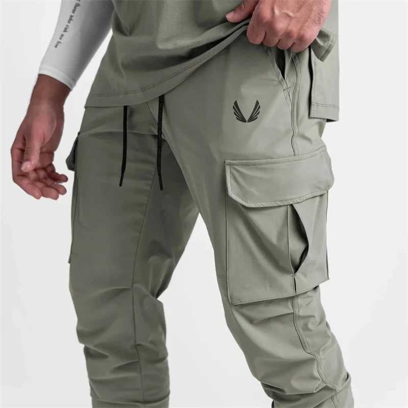 2024 New Mens Cargo Pants Summer Thin Loose Quick-Drying Elastic Leggings Running Training Sweatpants Casual Trend Trousers X250319
