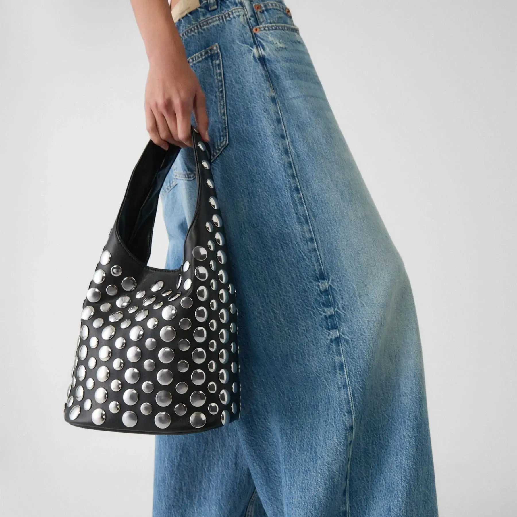 Punk style embossed double-sided circular inlaid niche luxury bucket bag fashionable womens underwear large capacity shoe bag Y250318