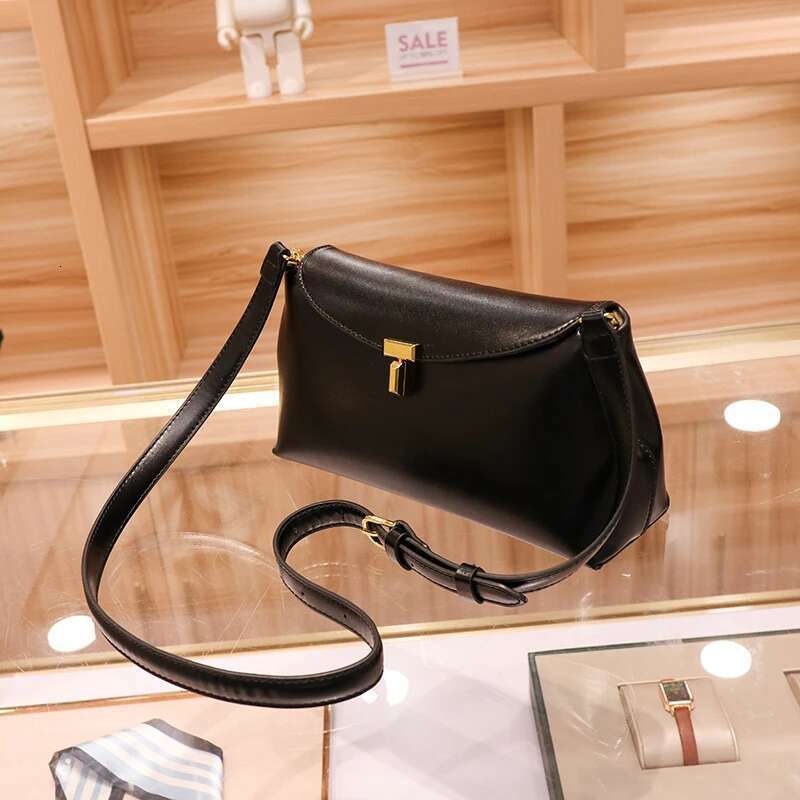 2025 new women's niche simple top layer cowhide T-shaped lock fashion commuter crossbody large capacity shoulder bag