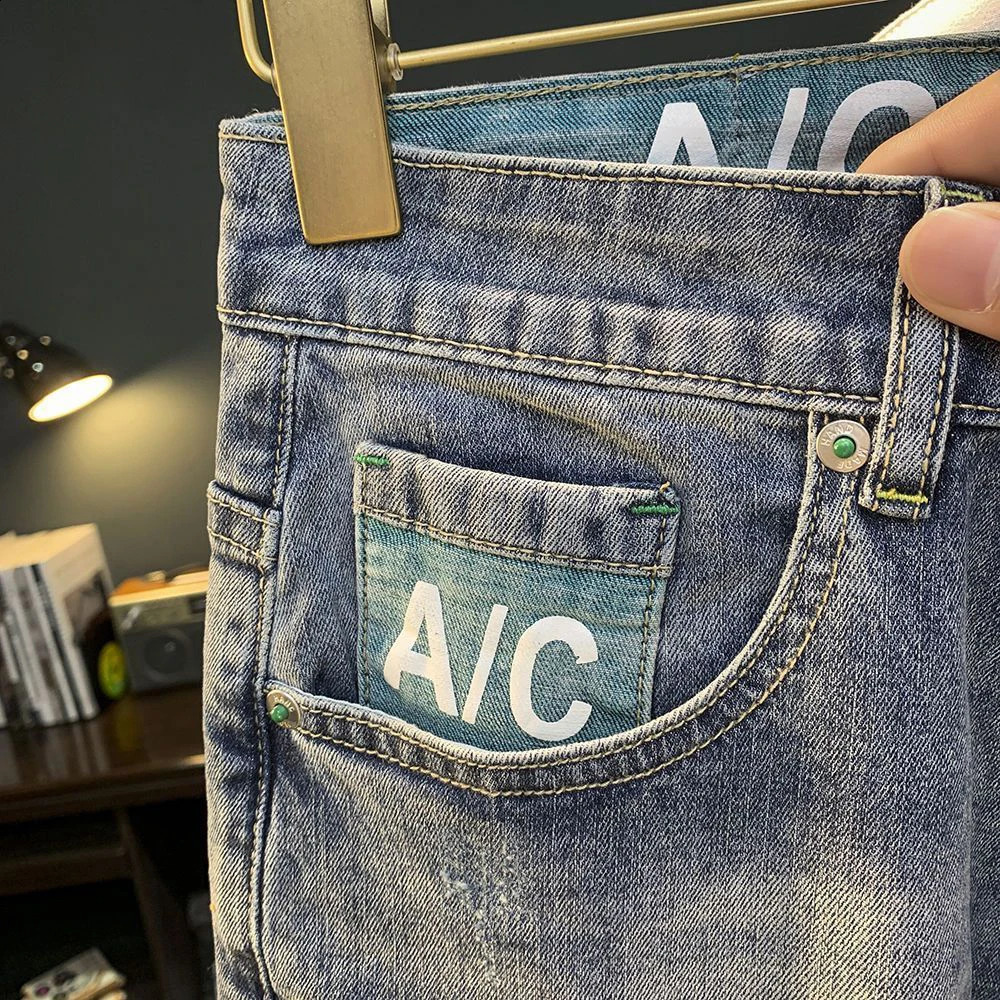 thin denim shorts with text pockets for summer featuring Korean street fashion and casual hiphop old n Y2k trendy 250318