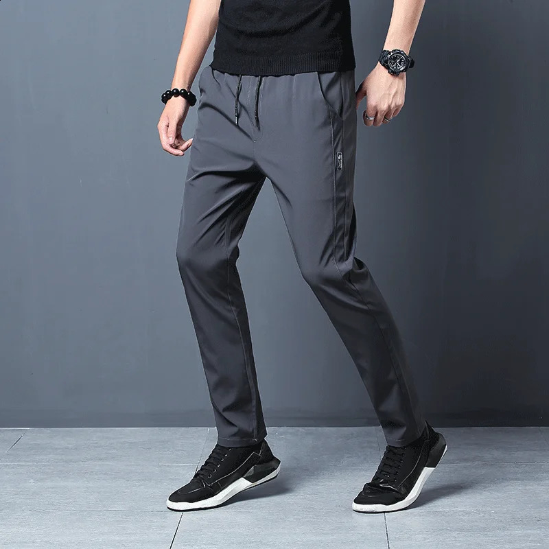 2025 MenS Korean Fashion Casual Summer Thin Quick Drying Ice Silk Straight Pants Loose Sports 9-Point Trousers Boy 250317
