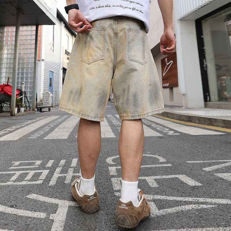 Yellow mud-dyed washed and worn-out holes straight denim cropped pants. Retro mens summer straight thin shorts are fashionable W250319