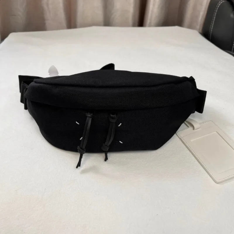 Unique and trendy black nylon crossbody bag for both men and women featuring a niche original and fashionable waist bag 250318