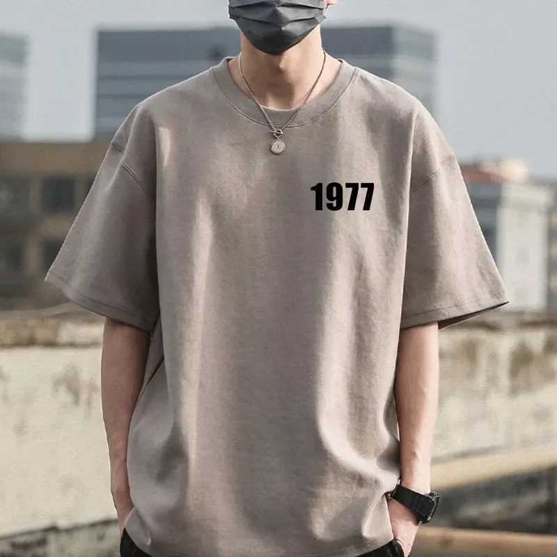1977 Childrens Fashion Designer Mens T-shirt Cotton Couple Top T-shirt Casual Summer Womens Brand Short Sleeve T-shirtT250318