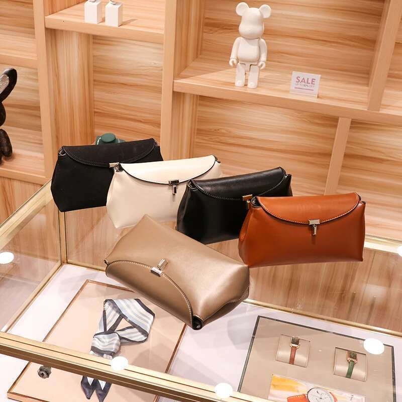 2025 new women's niche simple top layer cowhide T-shaped lock fashion commuter crossbody large capacity shoulder bag