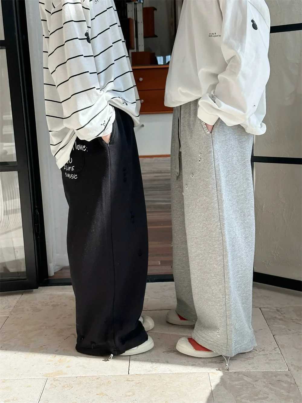 Spring 2025 Korean version of perforated knitted sanitary pants for boys and girls straight solid color casual trend styleT250318