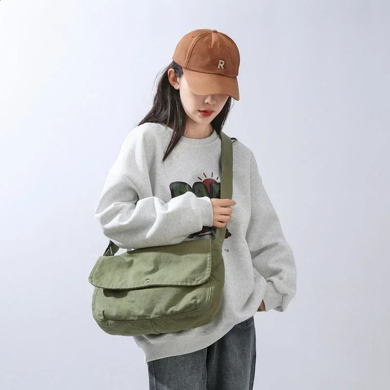 Solid canvas large capacity youth shoulder bag casual messenger womens cross body bag selling retro youth handbag 250318