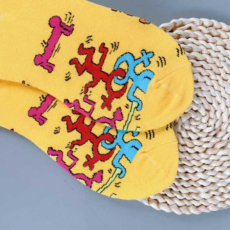 A pair of personalized graffiti symbols comfortable and trendy mens mid calf socks X250319