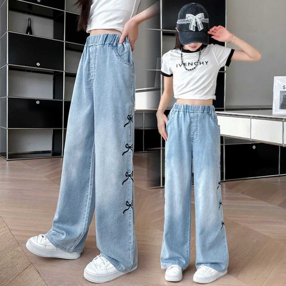2024 Summer New Girls and Childrens Thin Bow Strap Tight Jeans Wide Leg Pants and Fashionable Elastic Waist DesignT250326