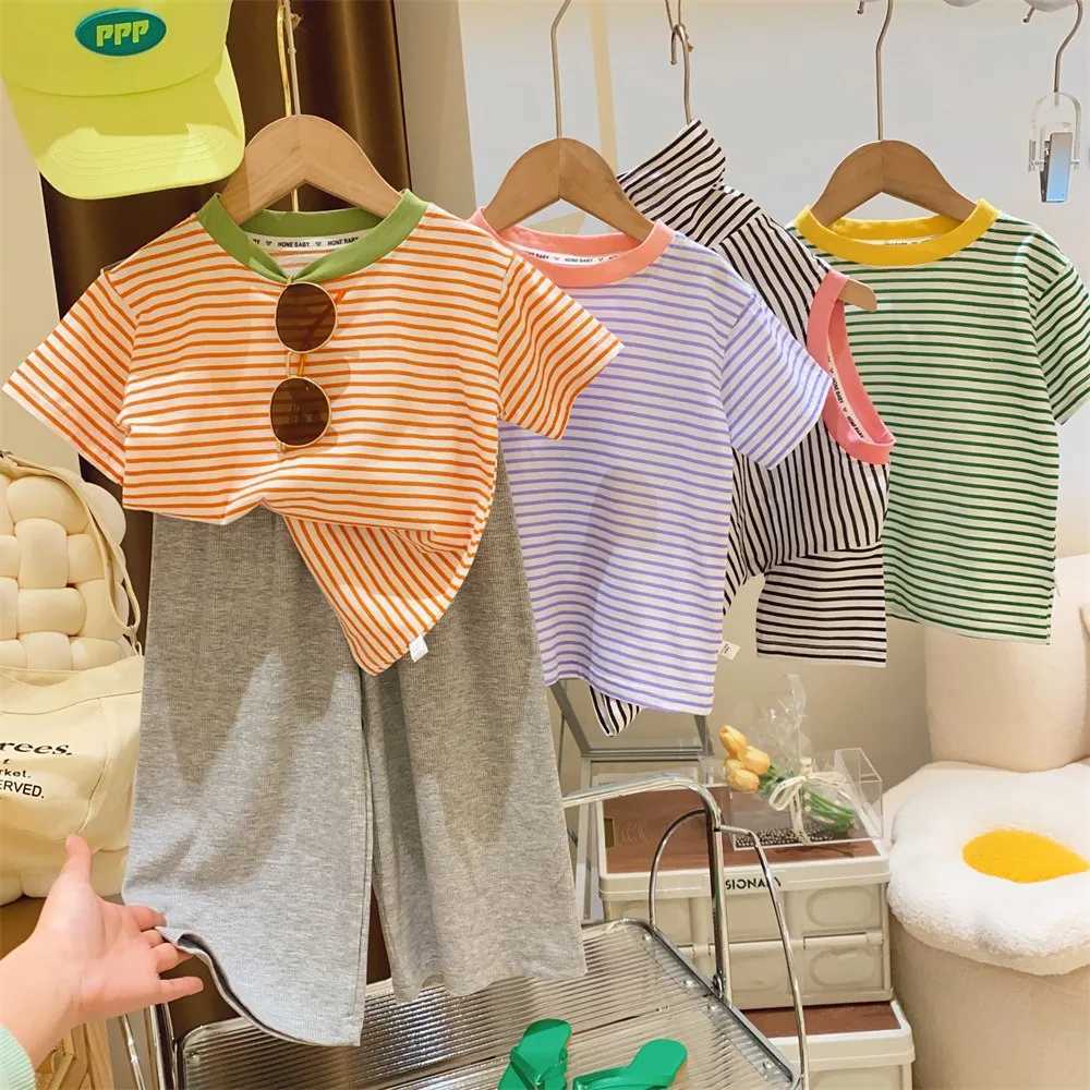 Childrens short sleeved boys and girls 2024 summer new striped T-shirt baby thin half sleeved bottom shirt casual wearT250320