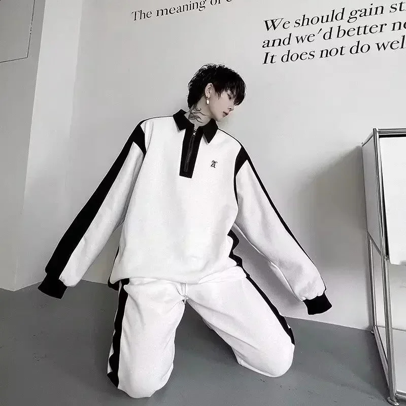 High end black and white splicing contrasting color sports long sleeved set twopiece pants casual mens wear 250319