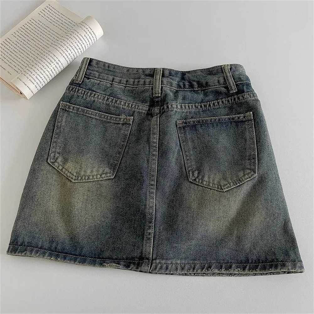 2024 Spring New Womens High Belt Anti Exposure Short Skirt Retro Dark Fashion Solid Color Short Skirt Word Cowboy SkirtXJ250320