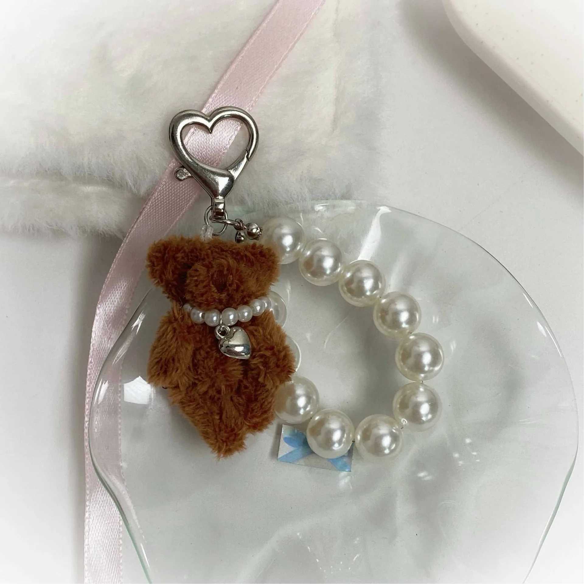 Korean cute fluffy teddy bear pearl bow pendant keychain used for car keys iPhone accessories fashionable heart-shaped keychains womens handbagsXJ2503