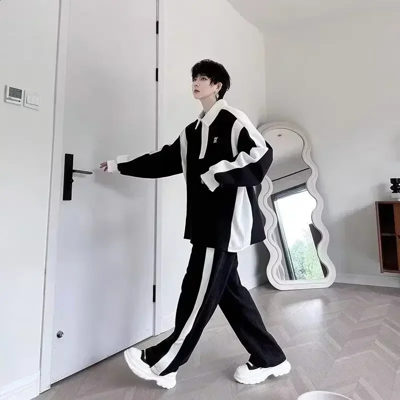 High end black and white splicing contrasting color sports long sleeved set twopiece pants casual mens wear 250319
