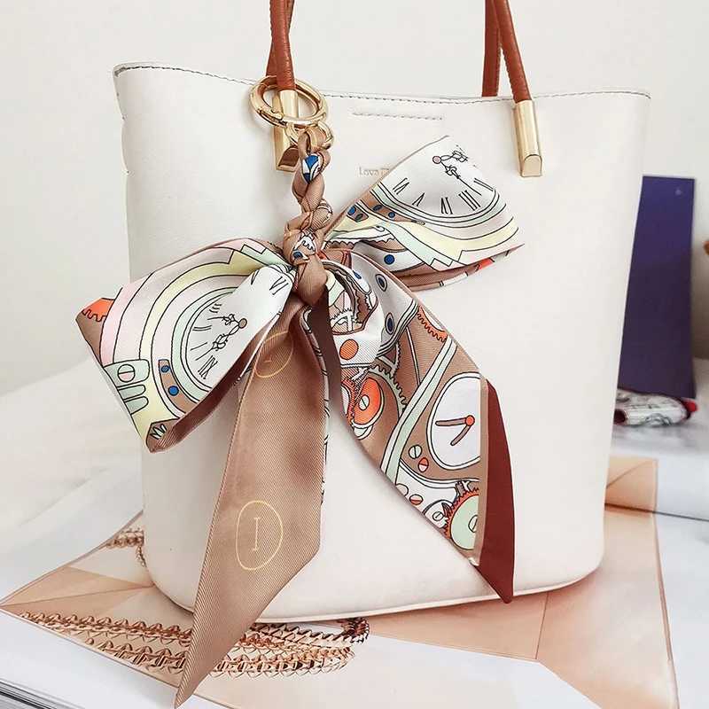 Fashion woven silk scarf keychain womens satin ribbon bow pendant keychain charm bag keyholder keychain accessoriesXJ250319