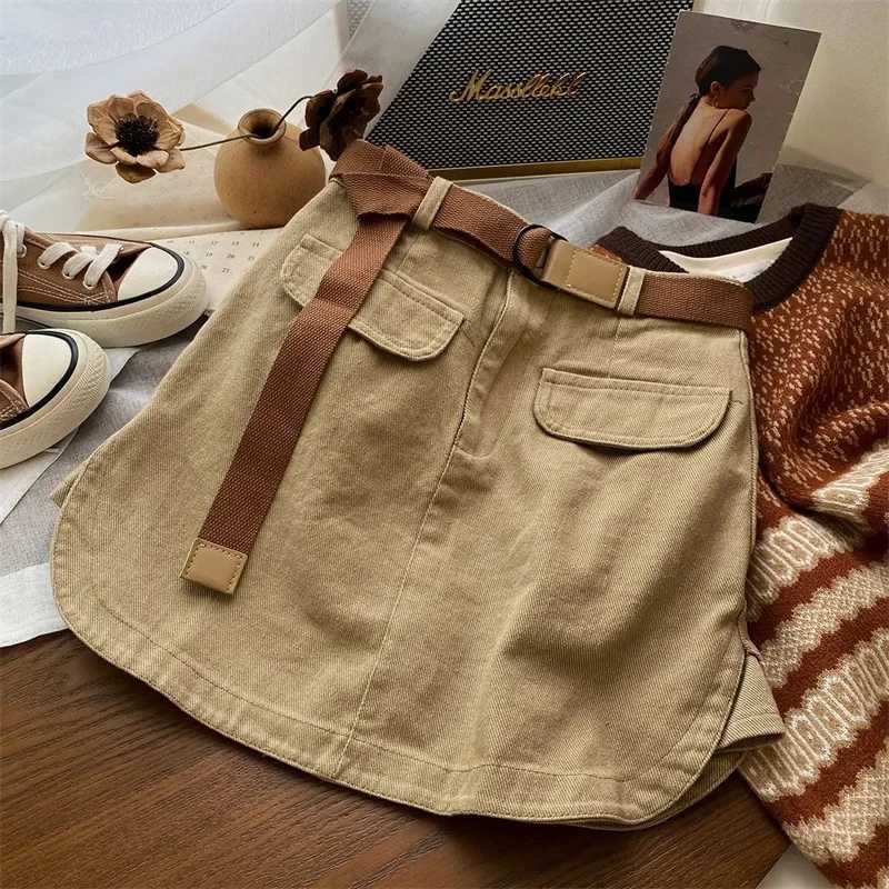 Korean denim tight fitting womens sari style short skirt high waistband cargo jeans tight fitting womens casual A-line skiing spring and autumnXJ25032