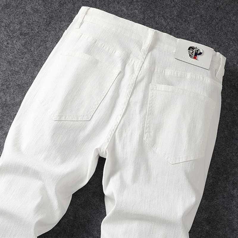 New mens casual torn denim jeans adhesive fabric hot stamping elastic small straight leg pants holes destroy AmericaT250319