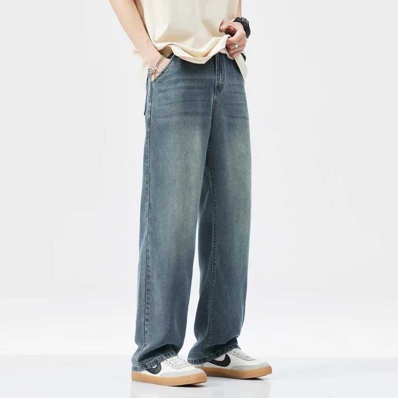 New Lyocell wide pocket jeans for mens fashion Korean straight stretch mens casual denim pantsT250319
