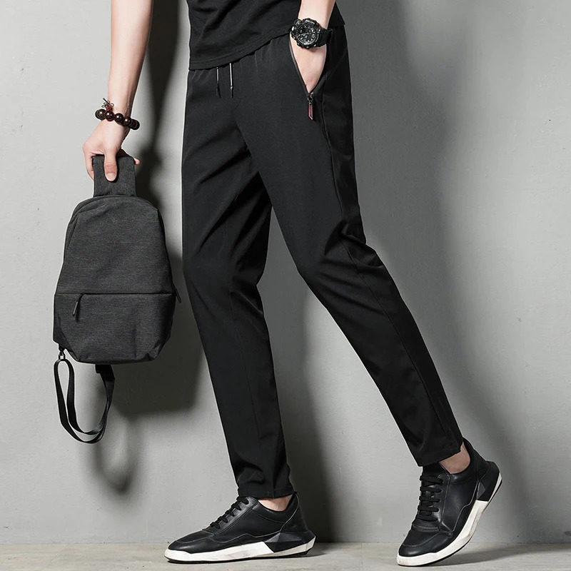 Summer mens casual pants slim suitable for thin Korean version ice silk Jinlun sports straight tube quick drying 250320