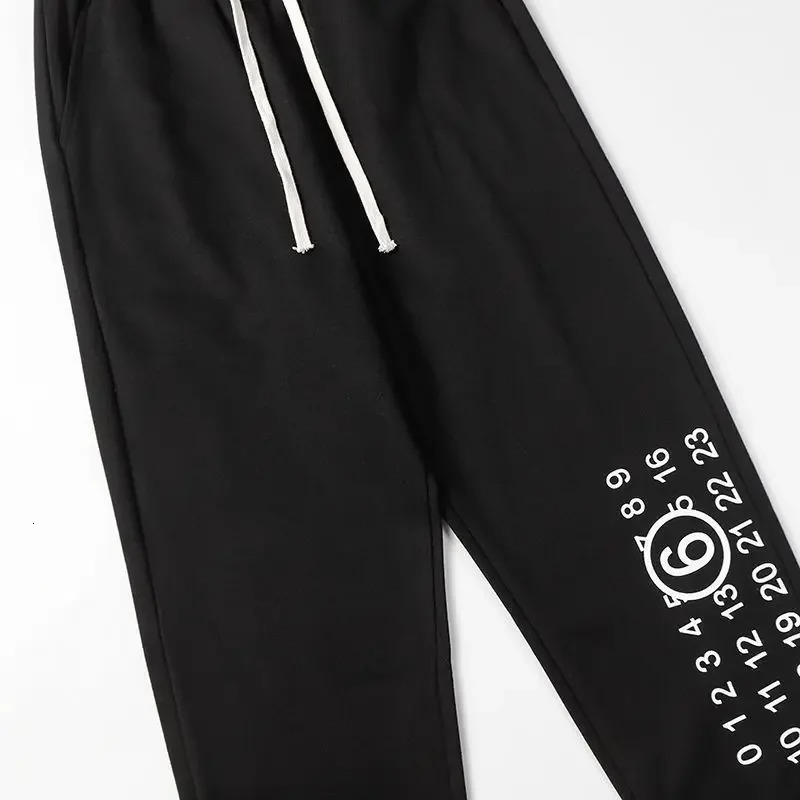 Spring and Autumn MM6 Letter Printed Tight Pants Loose Casual Dragging Mens Womens Sweatpants Thin Inner 250320