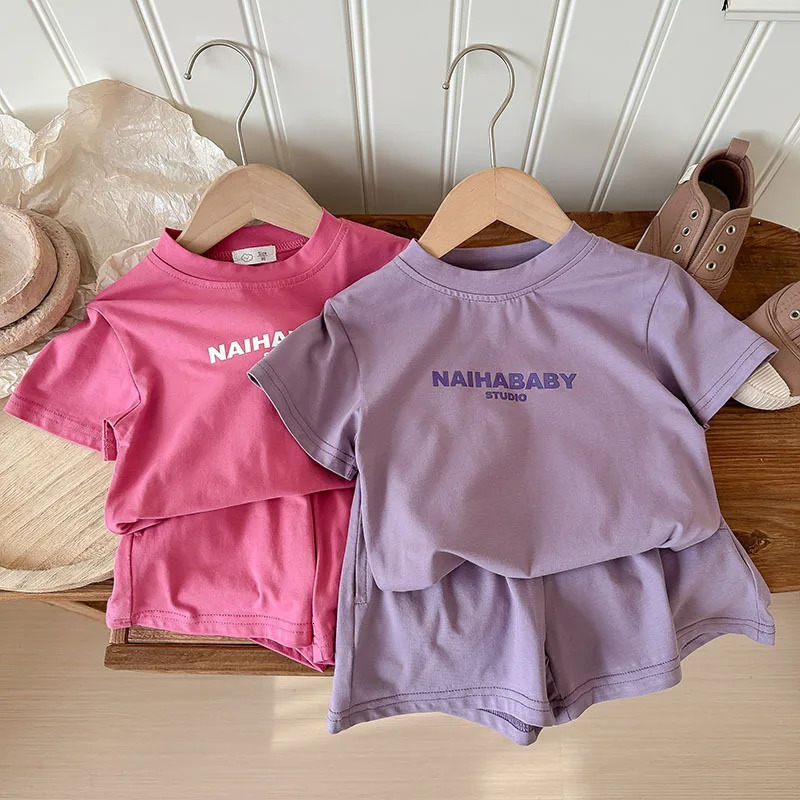 Summer baby girl sportswear set solid color letter printed Tshirtshorts 2PCS suitable for 210 year old boys casual wear 250319