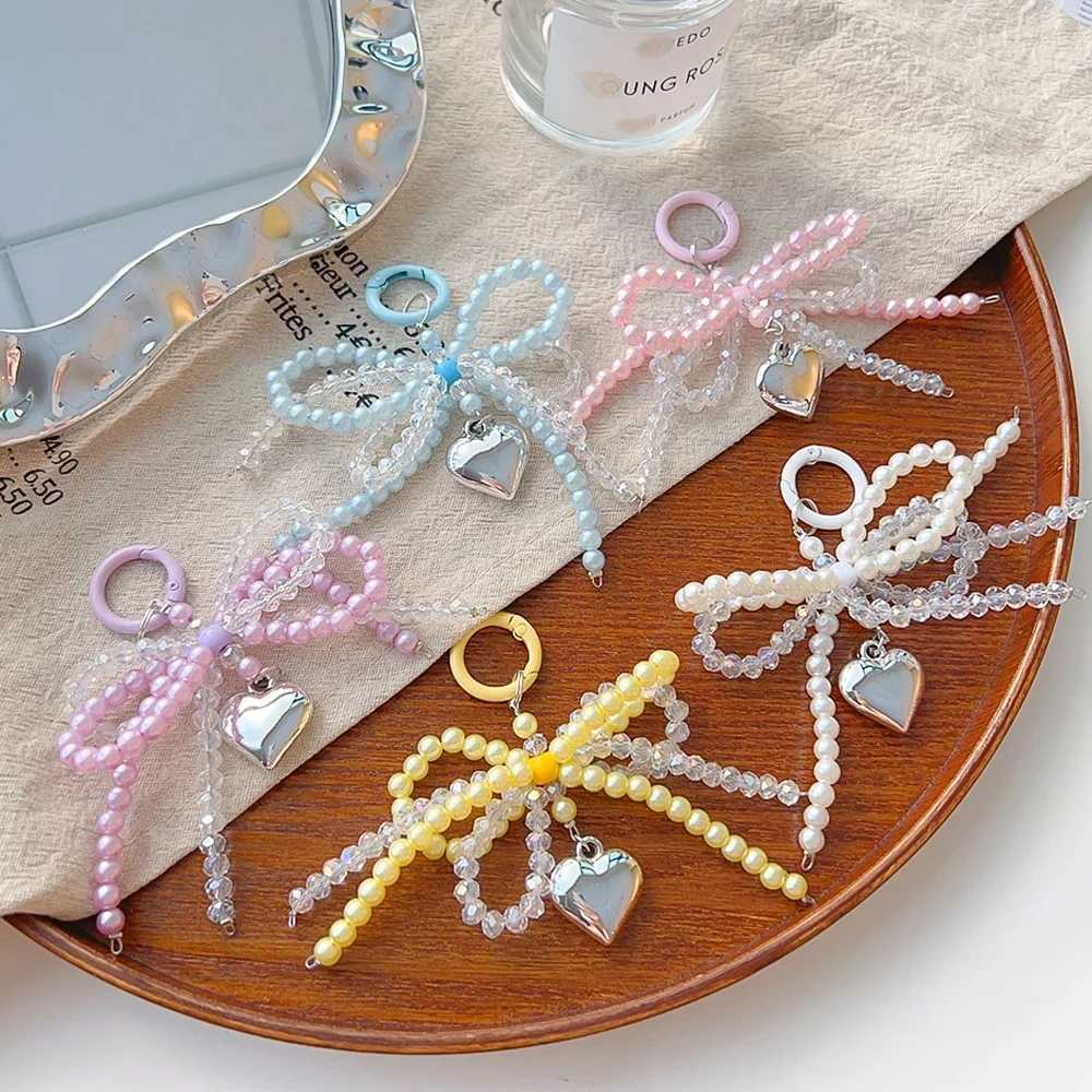 Handmade Delicate Beaded Key Chain Pearl Bow Shaped Pendant Keyring Heart Keychain Ornament Pearl Decoration For Bags PhonesXJ250319