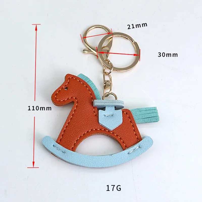 2024 Fashion Designer PU Leather Shake Horse Keychain Pony Pendant Decoration Womens Bag Keychain Charm AccessoriesXJ250319