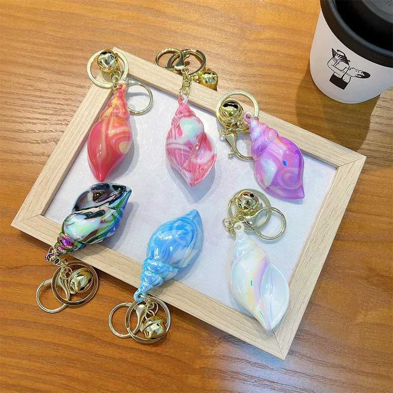 Electroplated colored Conch keychain suitable for women cute car keychain used for wallets backpacks bags charms acrylic keychains with lobster claspX