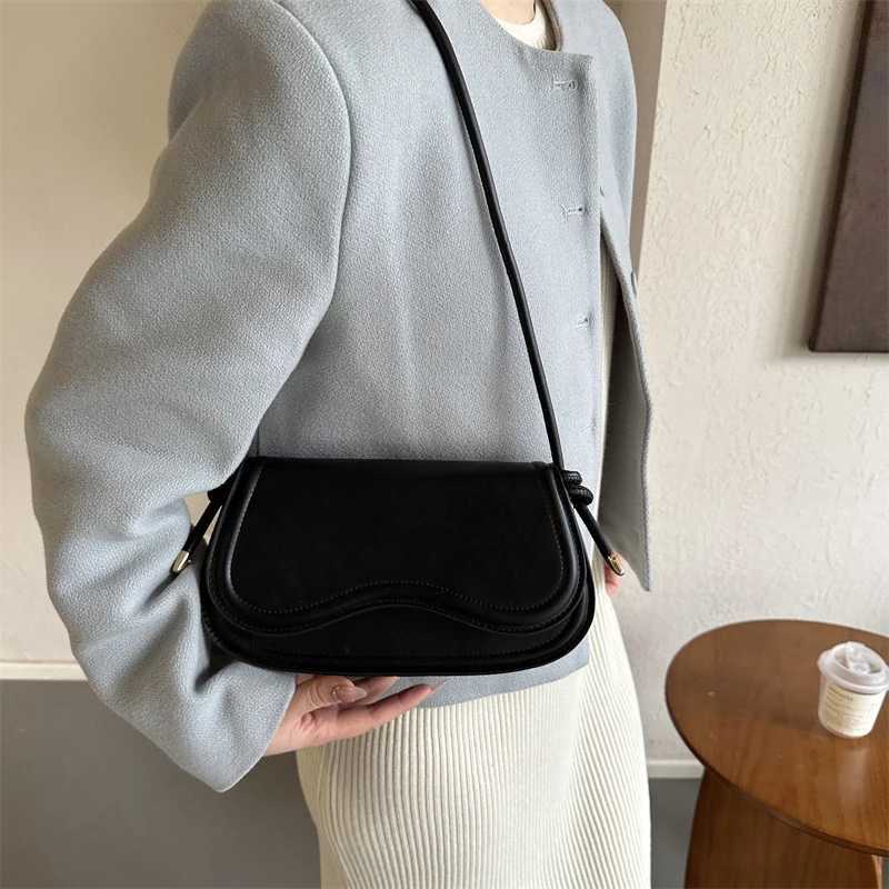 Fashion saddle bag simple casual cross shaped bag womens shoulder bag Y250319