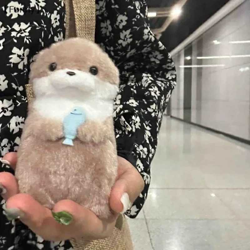 1 cartoon cute otter with fish/cat dog plush keychain creative Kavay keychain backpack hanging decorationXJ250319